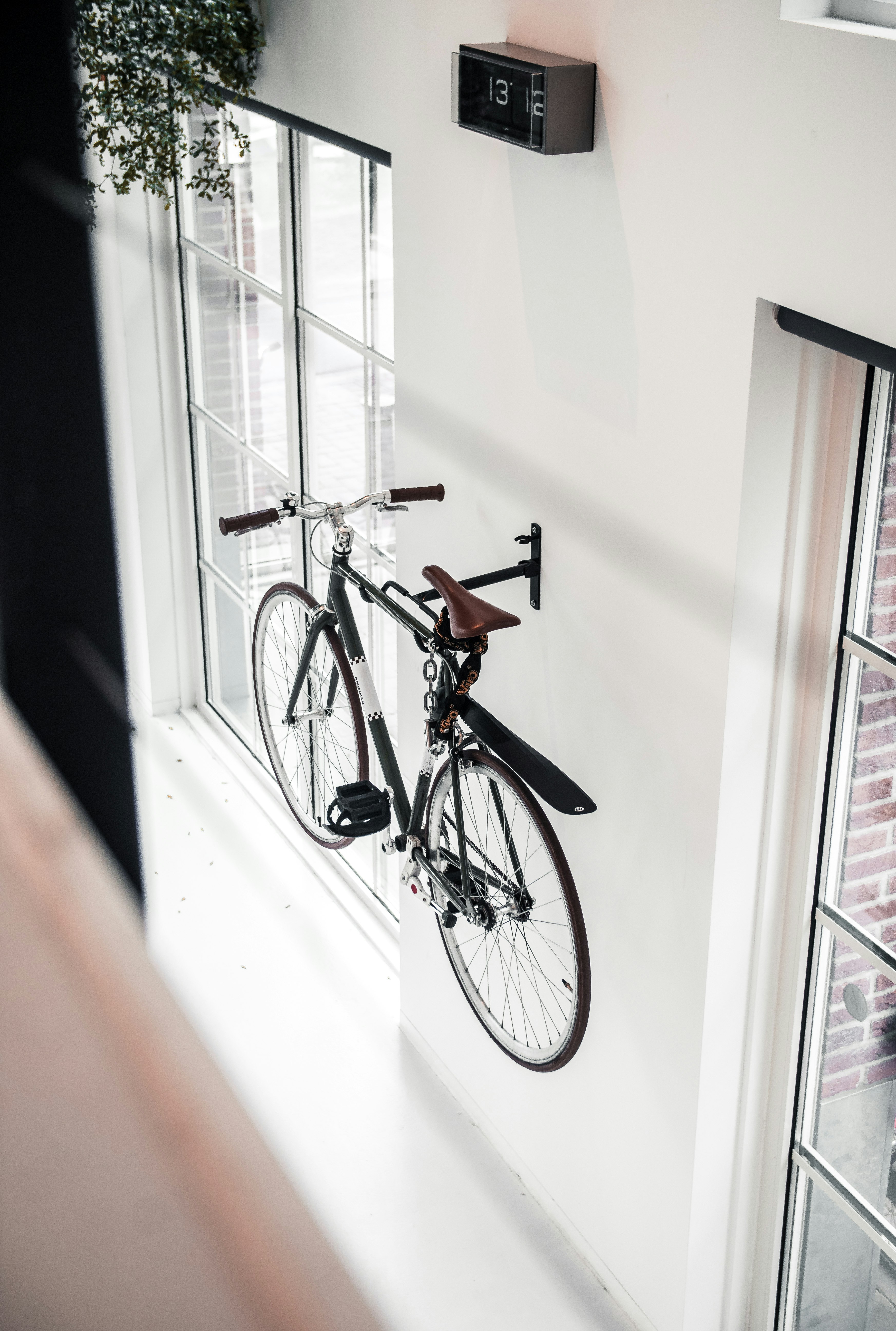black mountain bicycle mounted on wall